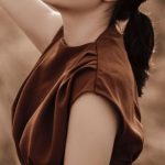 Reflective Cloth - Side view of young dreamy Asian female in elegant clothes with closed eyes on meadow on blurred background